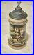 Antique-0-5-Liter-Stoneware-German-Beer-Stein-Hunting-01-lie