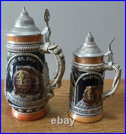 Authentic Vintage German Lidded ceramic Beer Steins set of 2 great condition