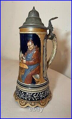 Tall vintage hand painted German pottery pewter lidded beer stein music box