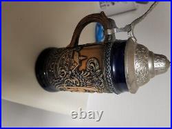 Vintage German Lidded beer steins